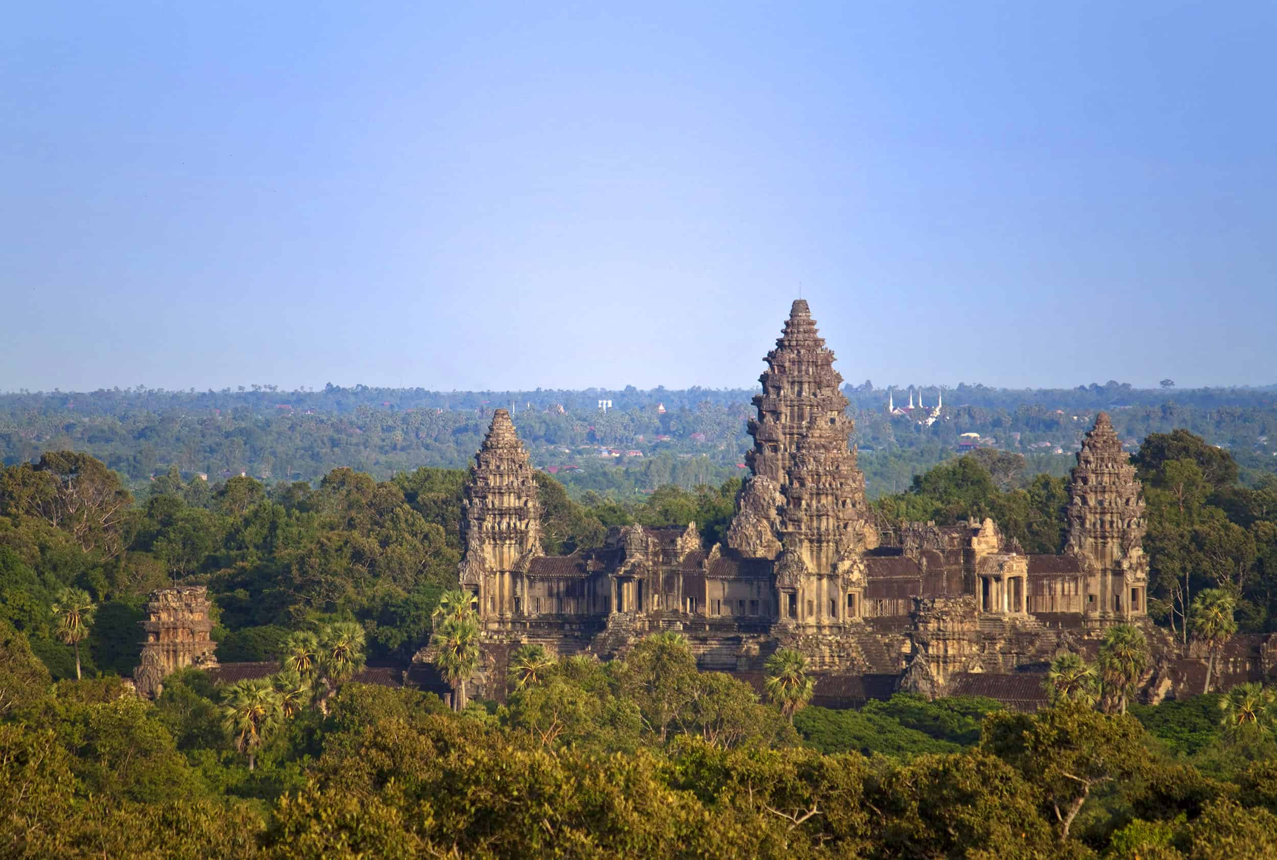 Angkor Wat Temple in Cambodia from a far above the jungle canopy