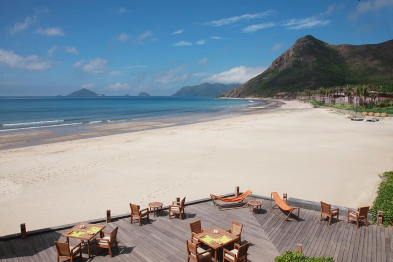 The beach at Six Senses Con Dao with a mountain in the background