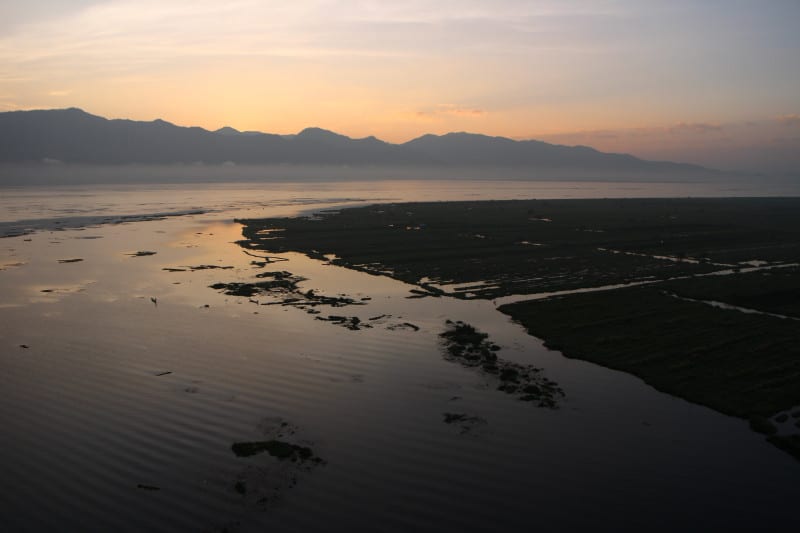 view of Inle Lake illuminated by the light of dawn