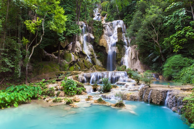 Kuang Si Waterfalls, beautiful cascade of blue waterfalls near Luang Prabang town in Laos.