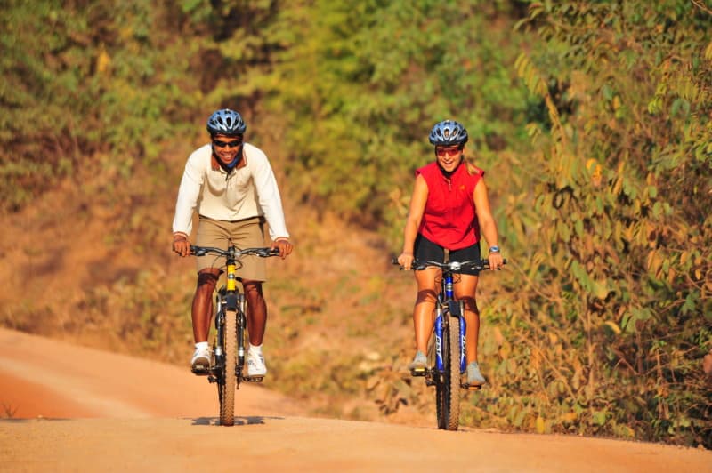 couple cycling outdoor on their bikes