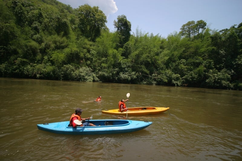 canoeing in kayaks in the river kwai