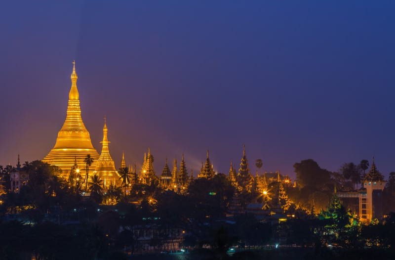 Shwedagon Pagoda in Yangon City, Burma with Beautiful Evening Light: the beautiful golden pagoda, the oldest historical pagoda in Burma and the world, in the evening with great evening light.