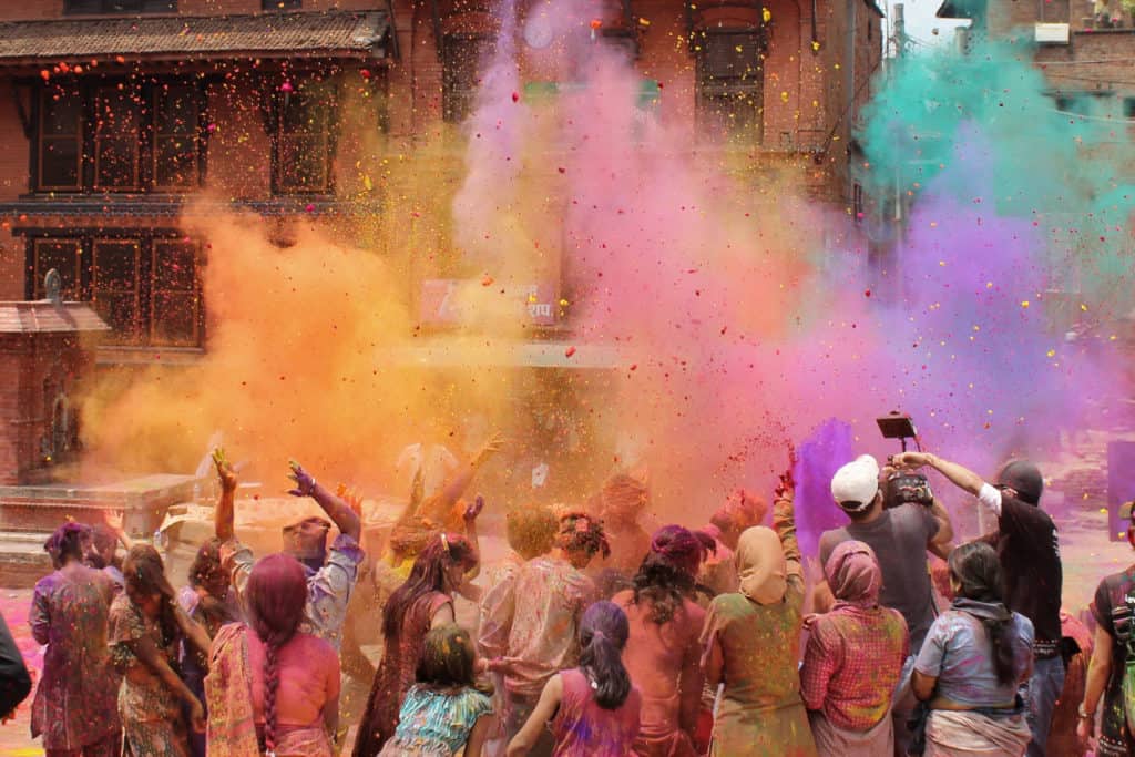 Colours been thrown in the air during the festival of Holi in Jaipur