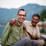 Photographer Tom Park next to man with his arm around him