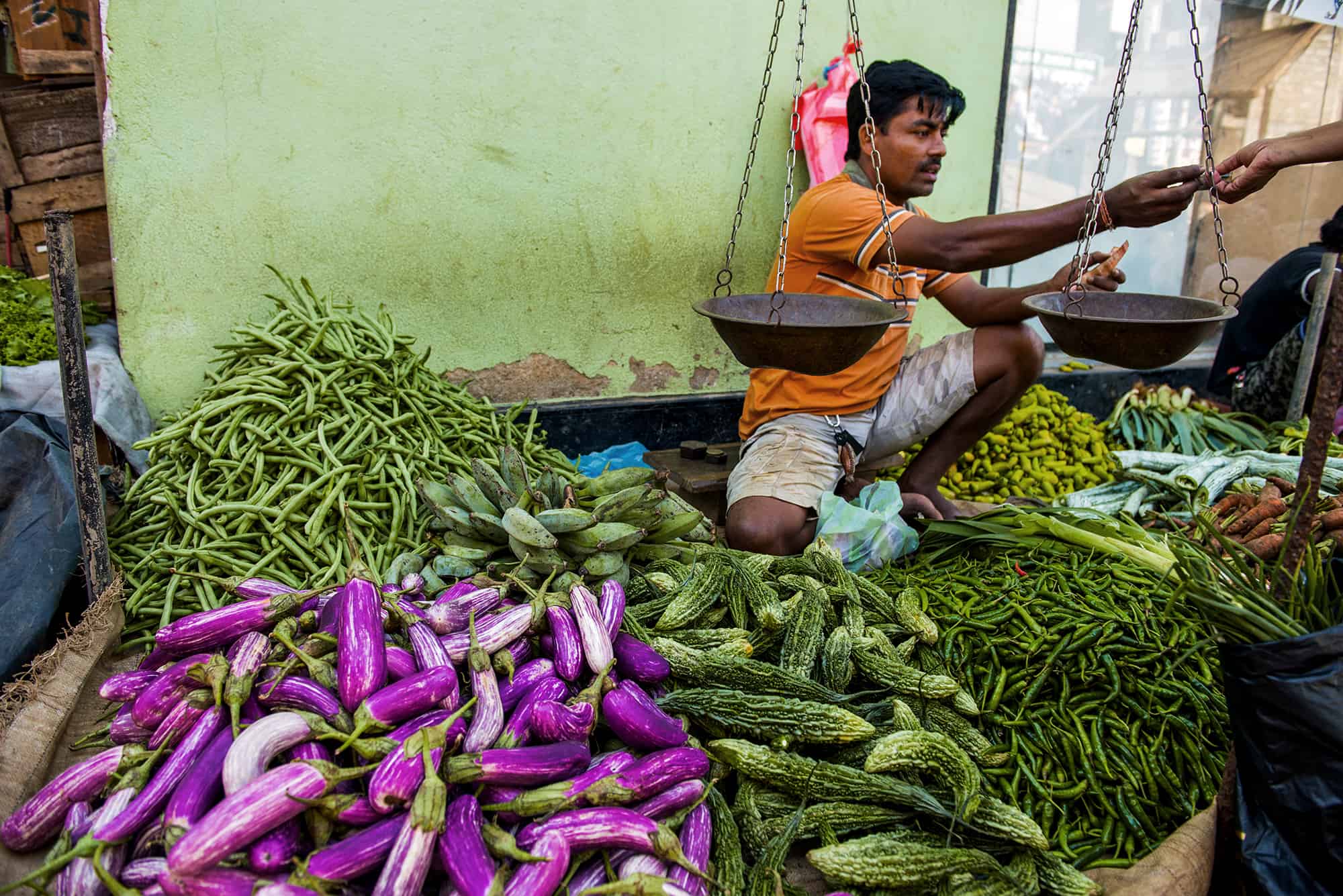 Local trader in a vegetable market near Galle