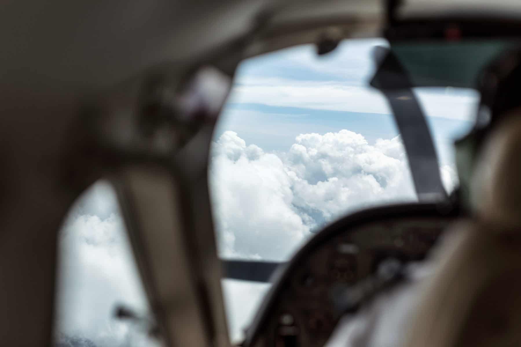 View of sky and clouds from plane window