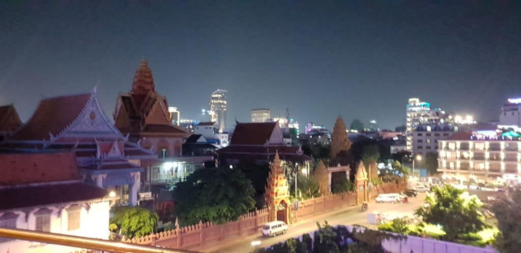 Contrasts of Phnom Penh: the city is starting to develop again after the recent devastation, and new buildings can be found with the traditional)