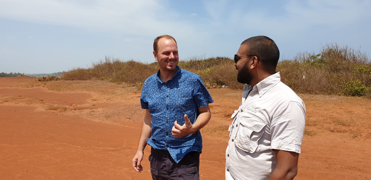 Traveller and guide exploring an arid landscape in Sri Lanka