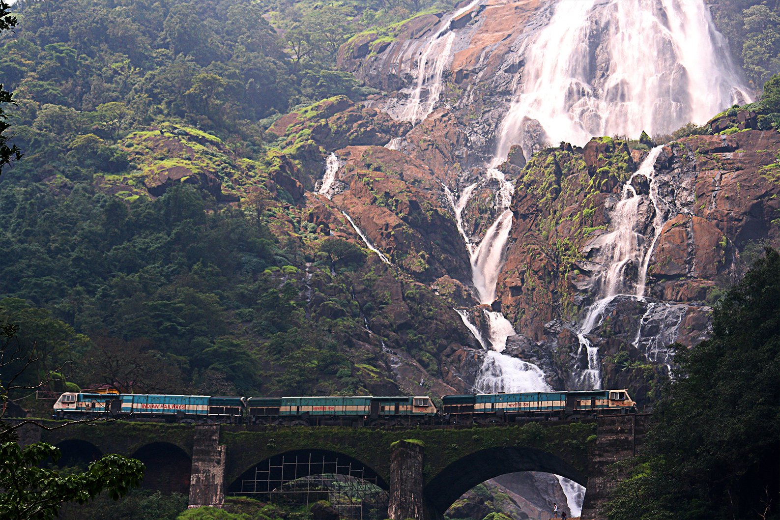 train crossing Dudhsagar waterfalls, the second highest in India on the way to Londa