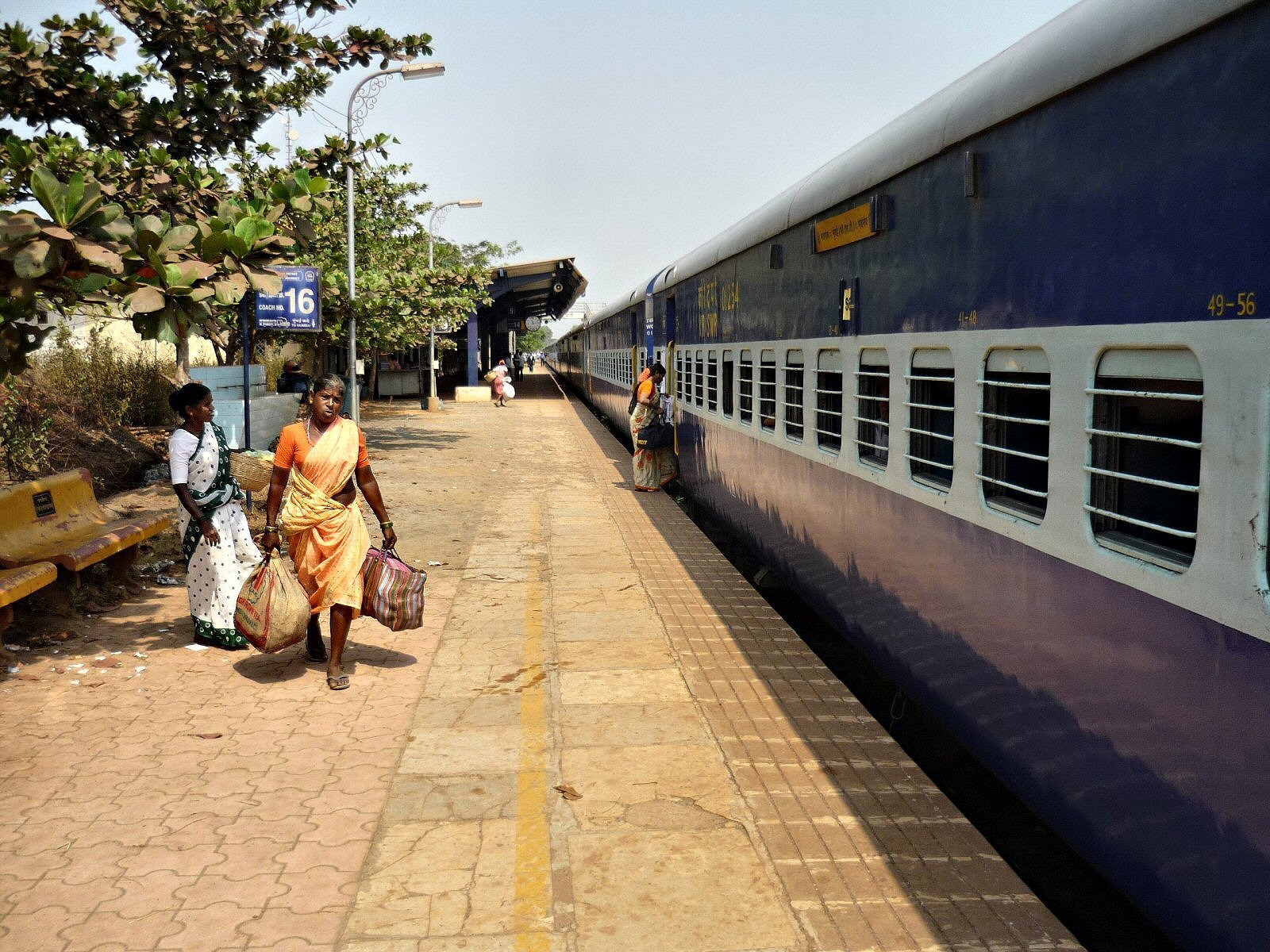 Mandovi Express waiting at a station in Maharashtra