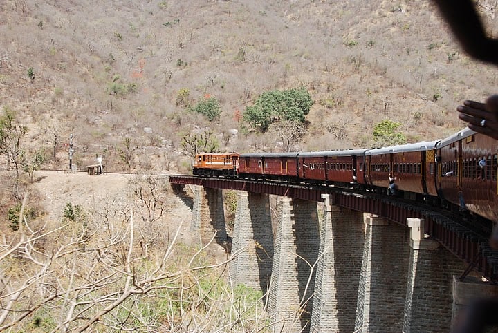 The 'monkey train' crossing a bridge in the Aravali hills of Rajasthan