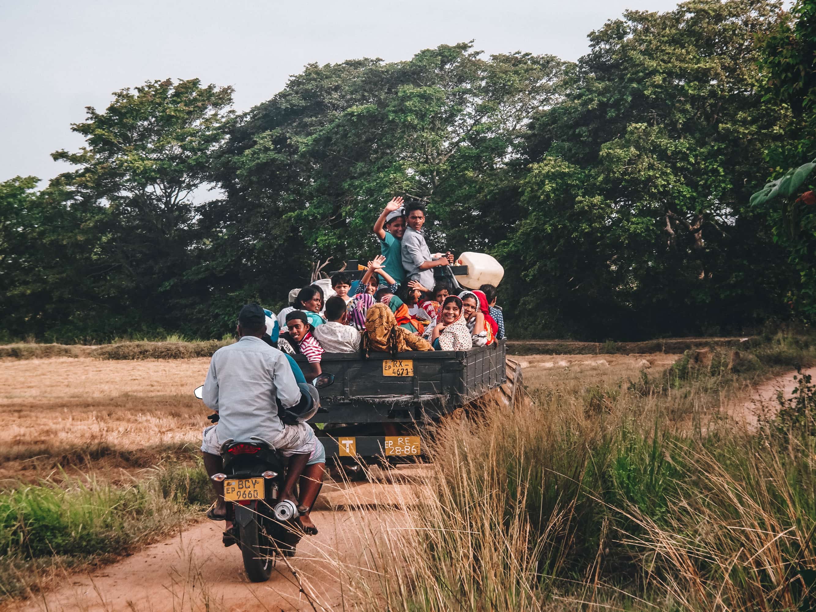 Local people driving in rural Sri Lanka