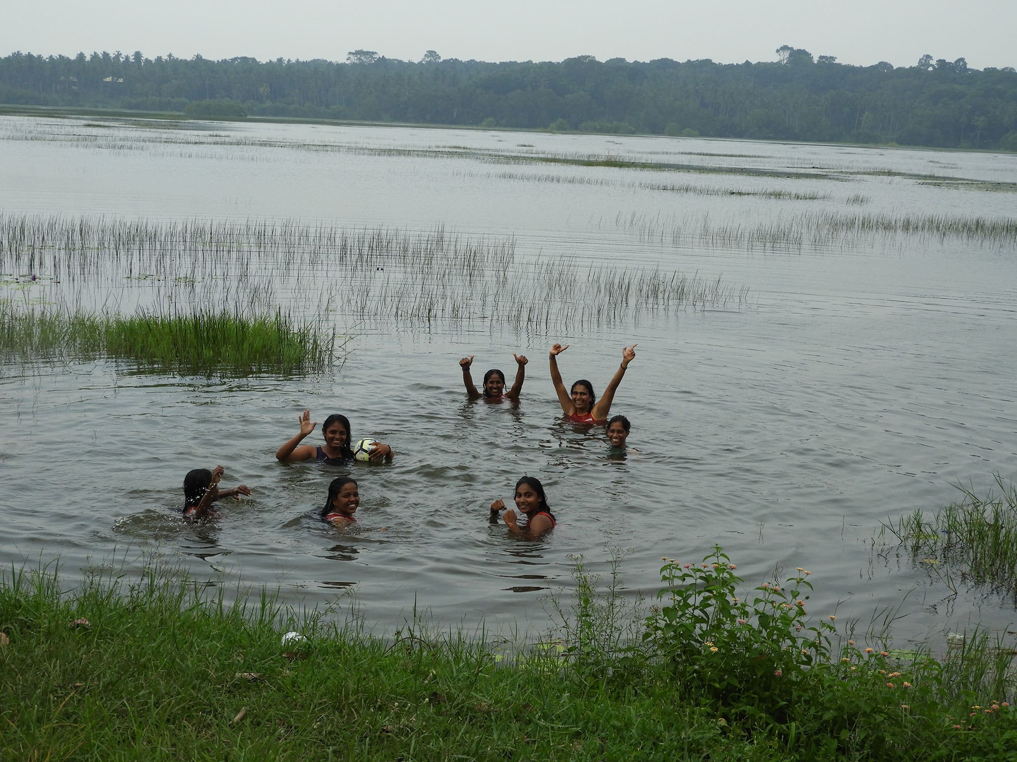 Family swimming in Sri Lanka