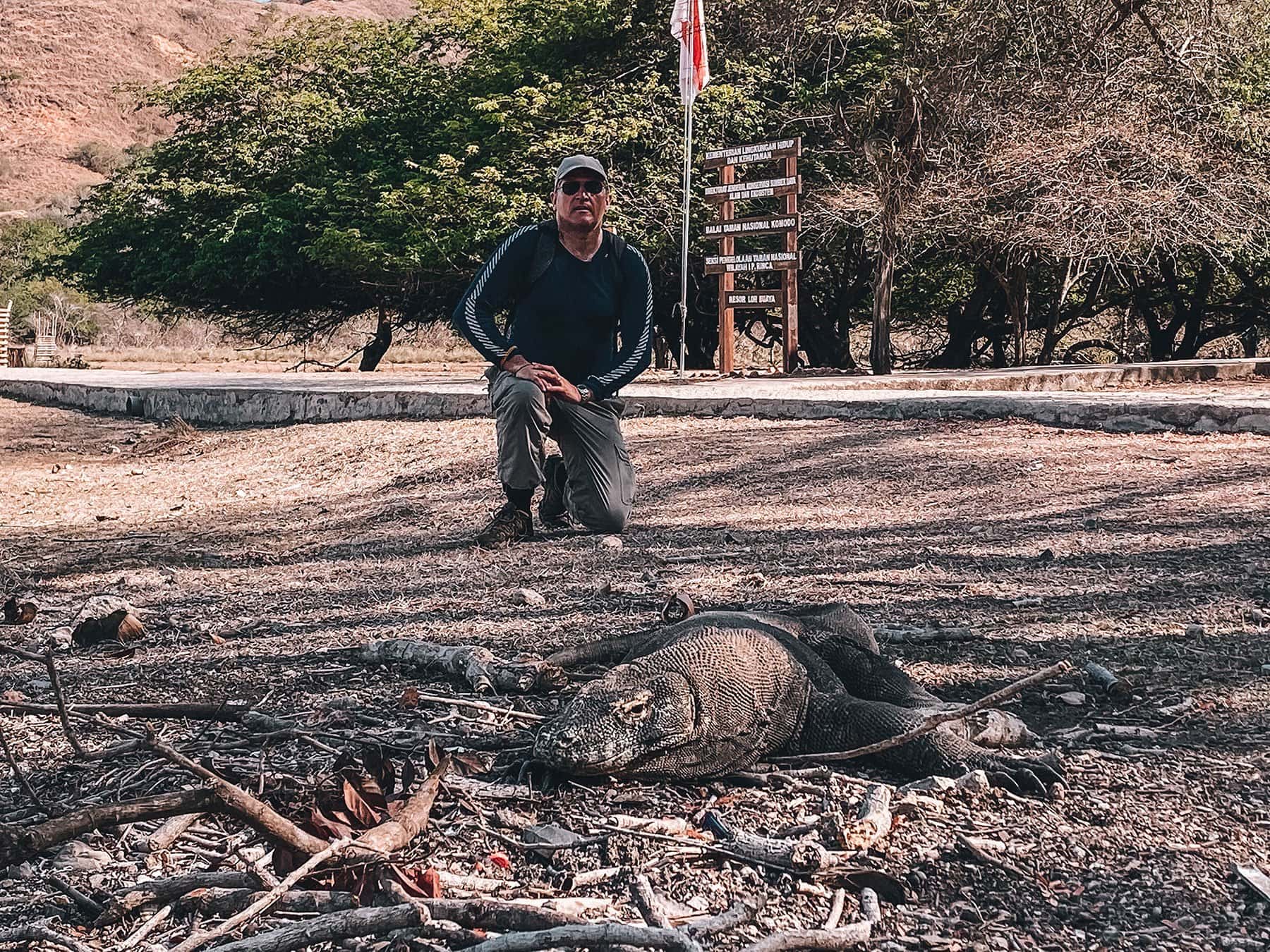 Tourist and komodo dragon