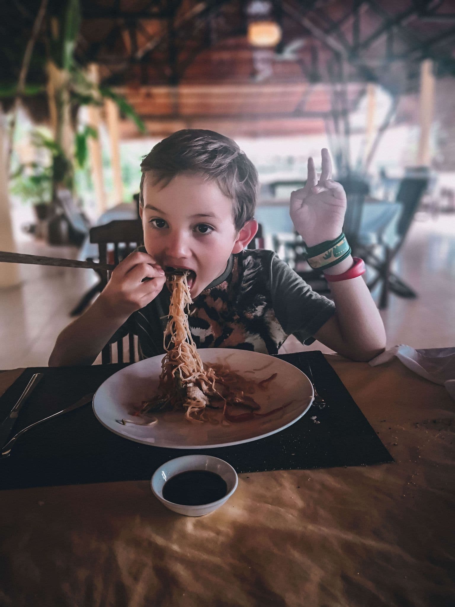 Child eating streetfood in Vietnam