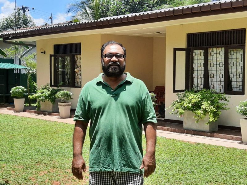 Chauffeur guide in his garden in Sri Lanka