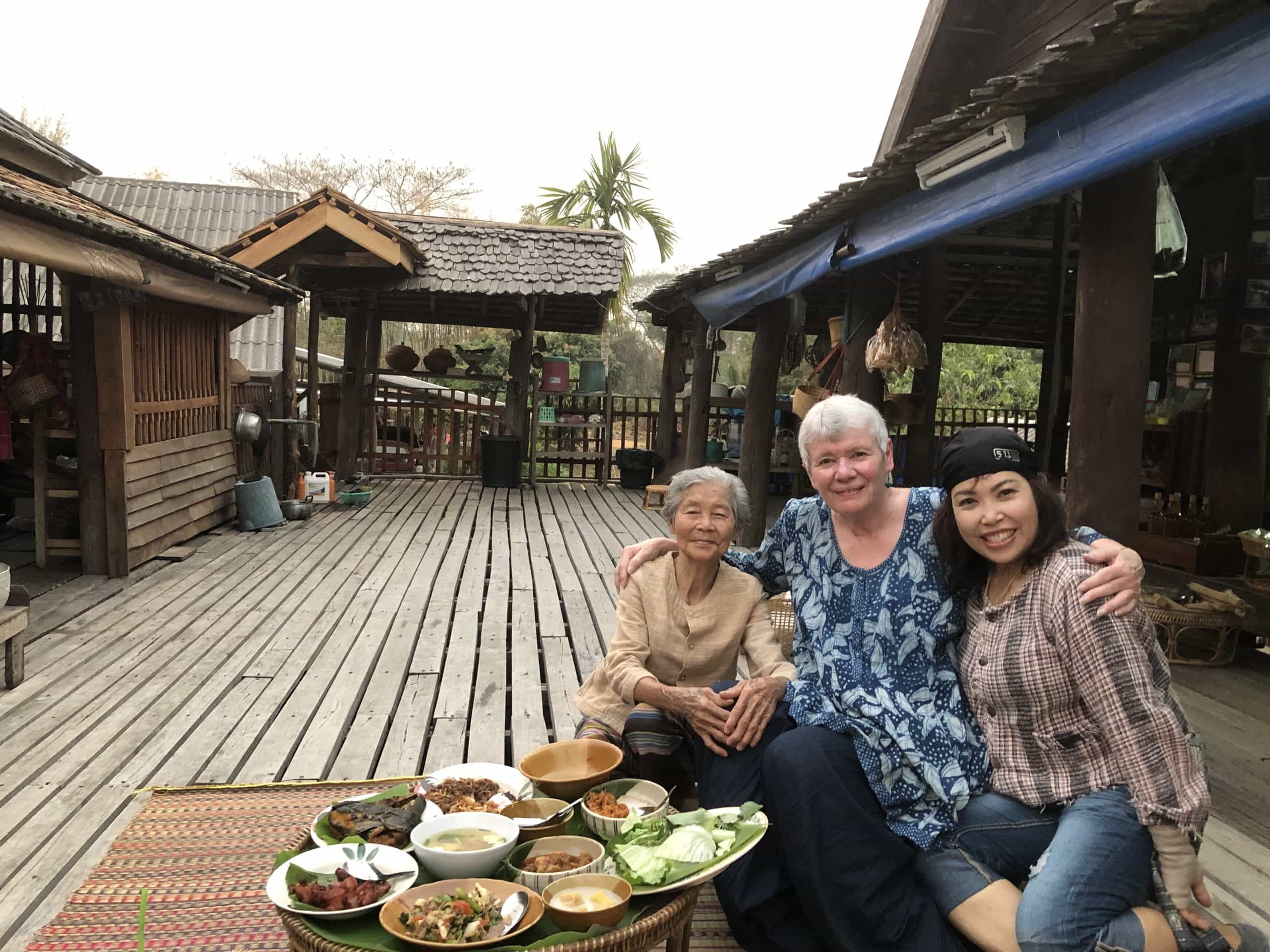 Traveller with local villages in Phayao, Northern Thailand