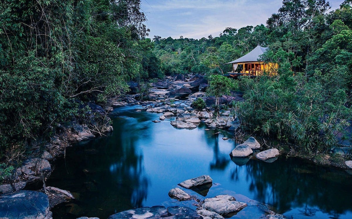 A luxury tent at Shinta Mani Wild overlooking the river in the heart of the Cardamom Mountains