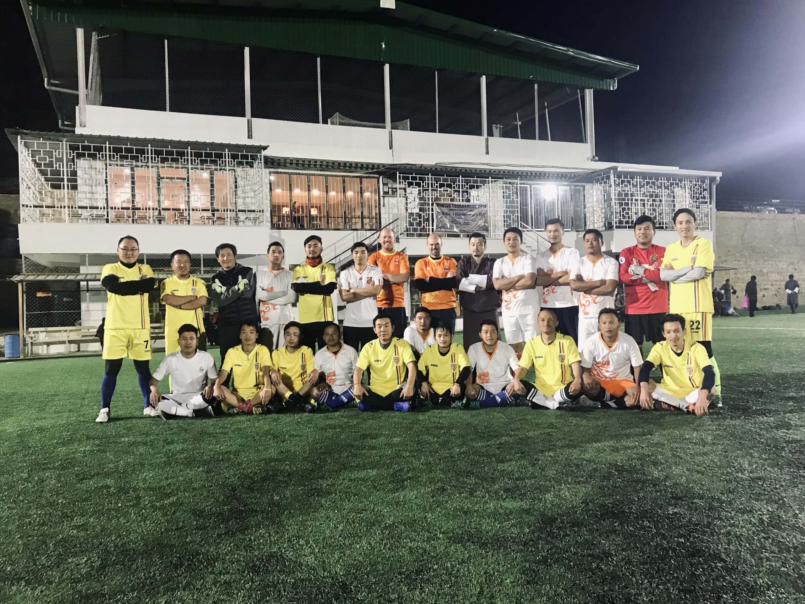 Two teams after a football game in Bhutan