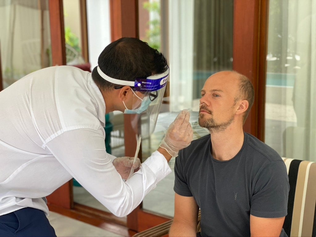 Tourist getting a PCR test at Amilla resort, The Maldives for Covid 19