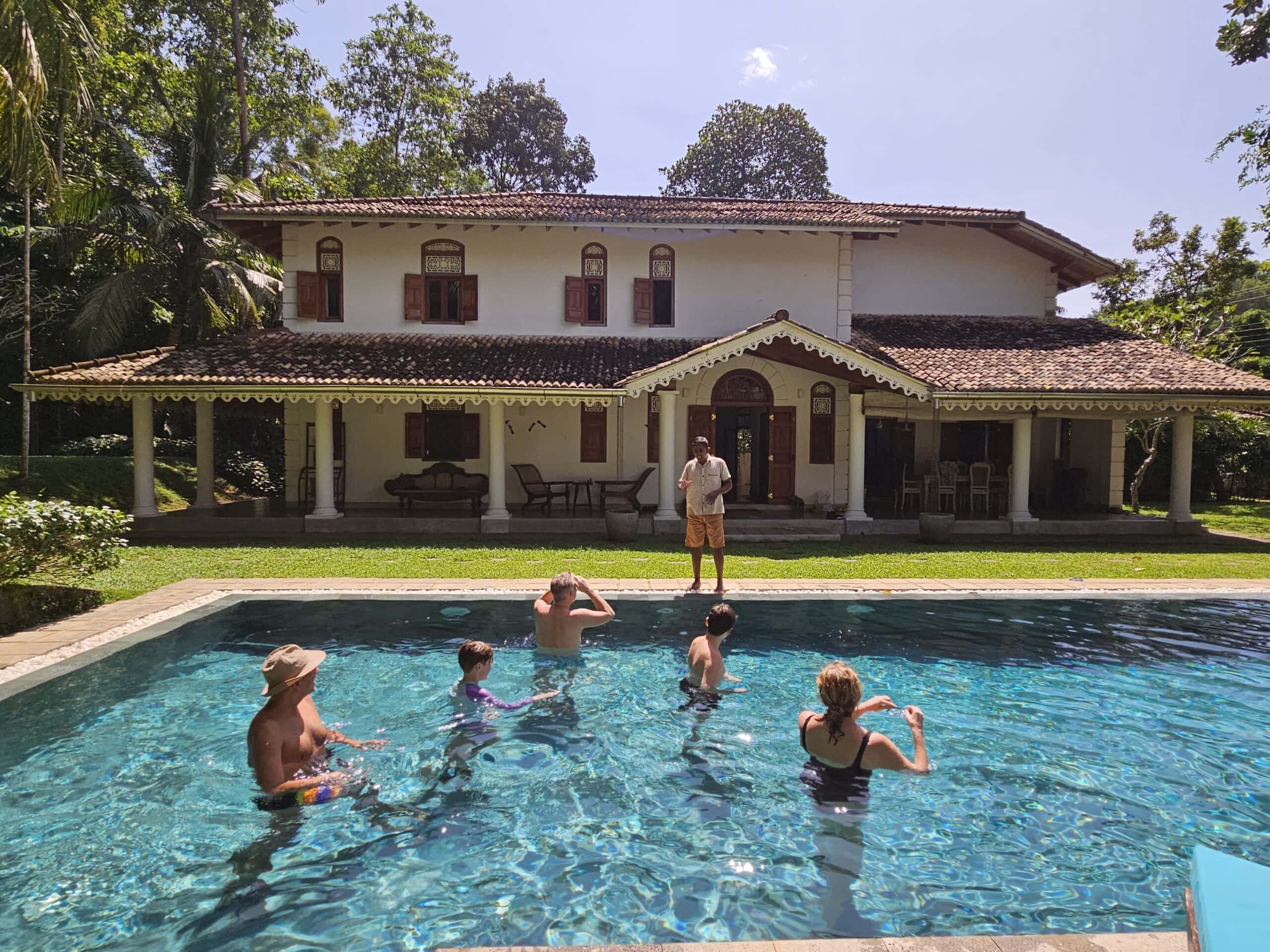 A family enjoying their Villa pool in Sri Lanka with ETG