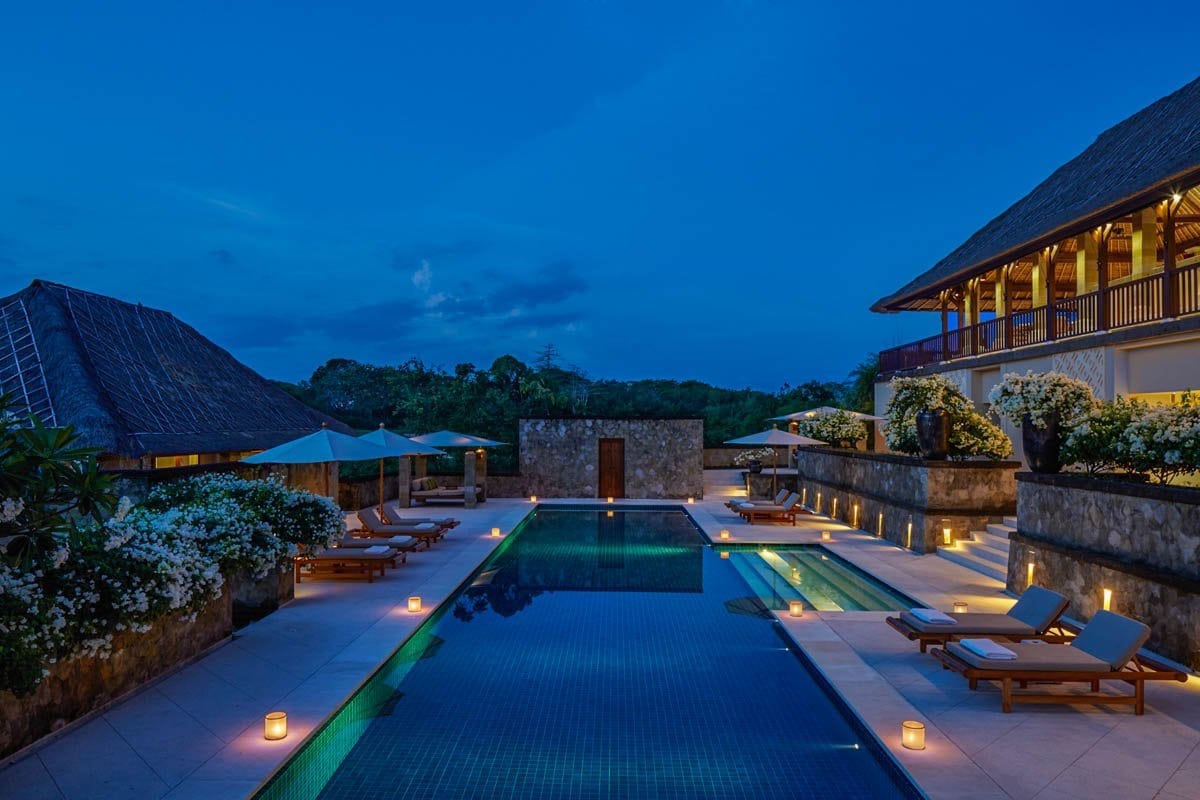 Pool at nightime at the Amanusa resort in Indonesia