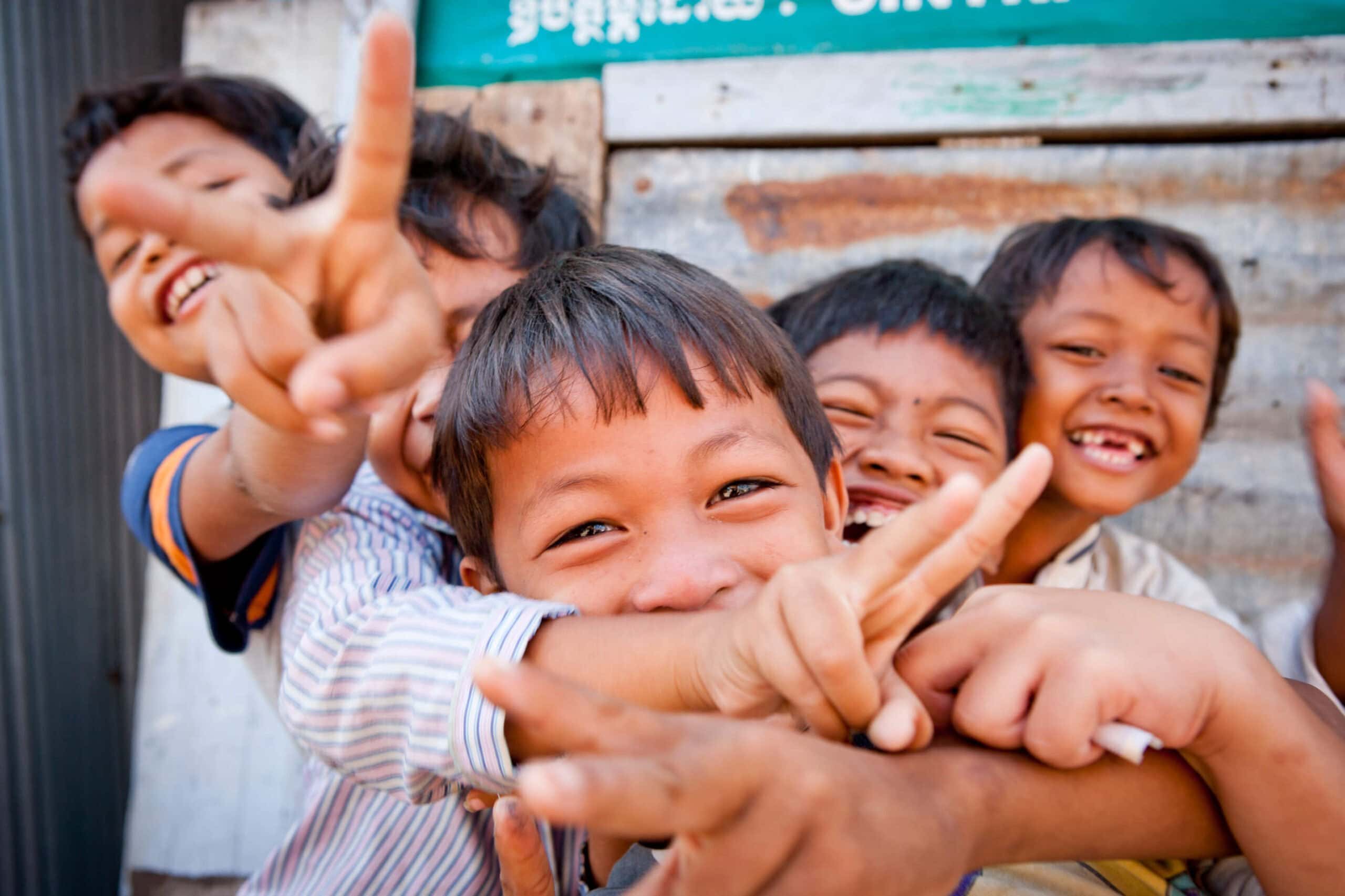 Children laughing on day trip with Save the Wonder in Cambodia