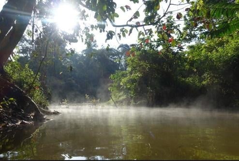 Steaming waters of a hot spring river in Borneo