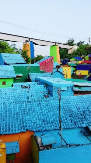 Bright blue roofs of Jodipan, Malang, East Java, Indonesia.