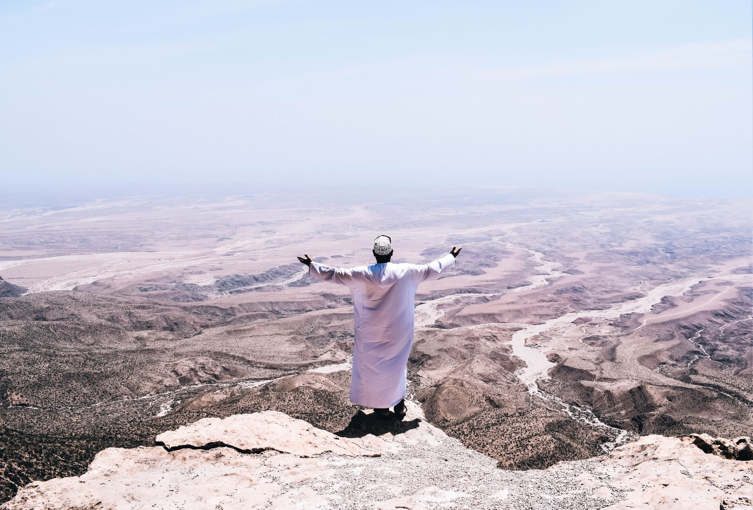 Planning a holiday to Oman involves taking a look at and embracing the whole country, like this man is from the mountains