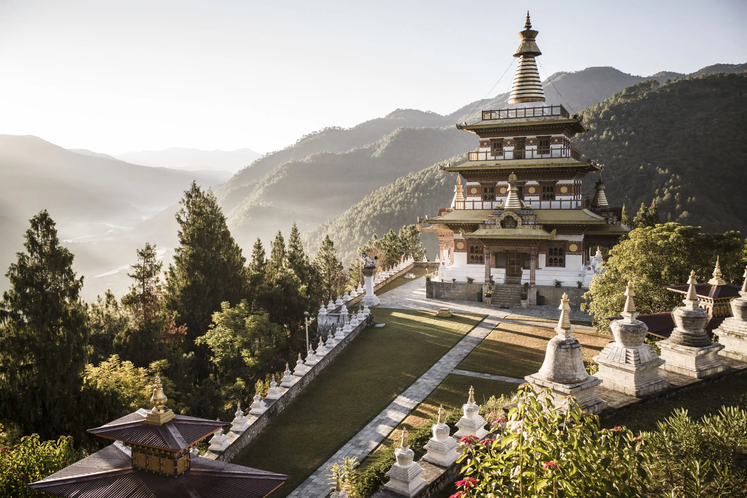 A landscape photo of the Khamsun Yulley Namgyal Chorten