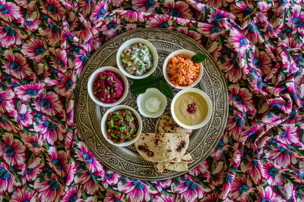 Traditional Sri Lankan dishes on a beautiful floral fabric