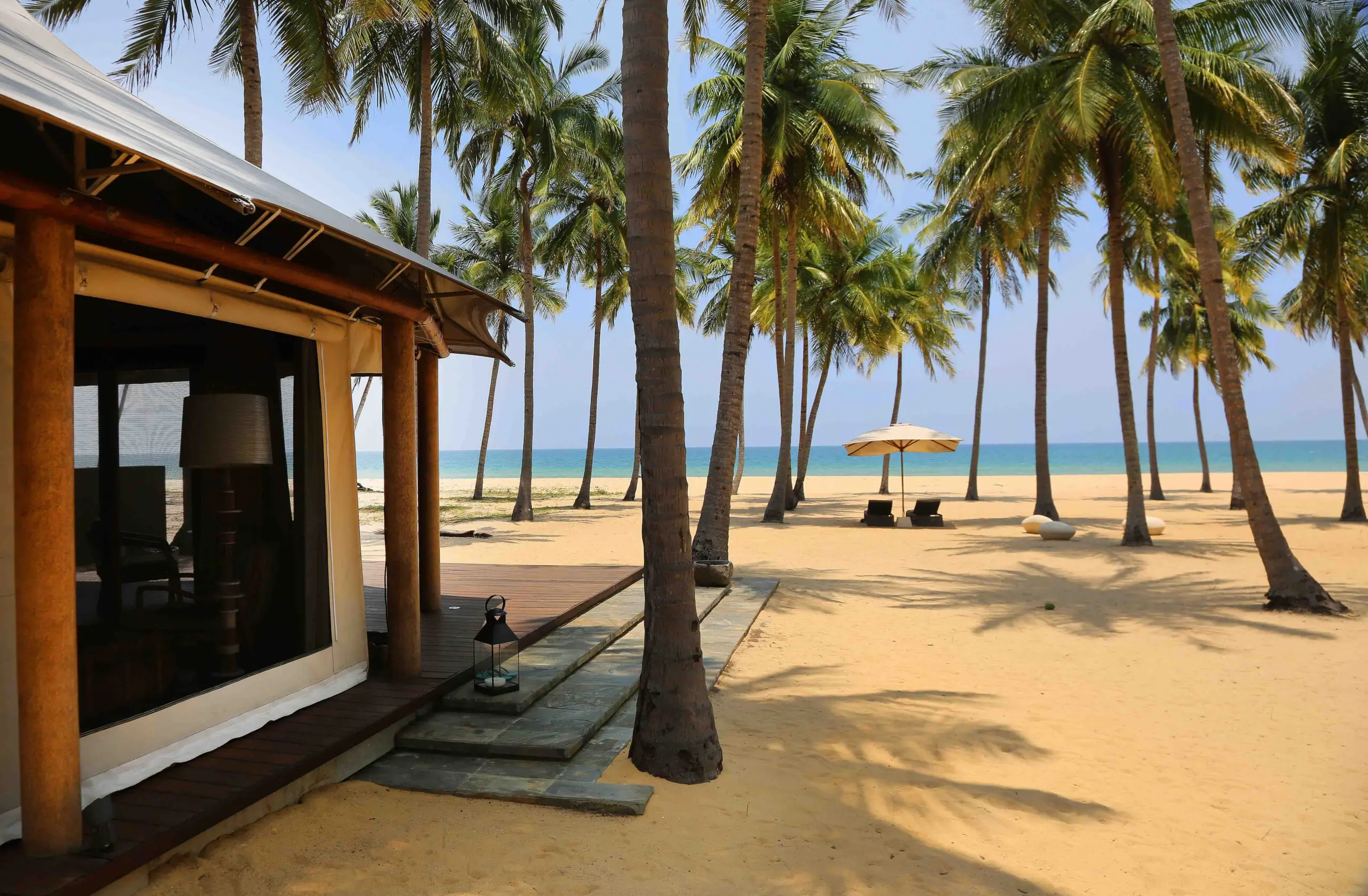 Palm-fringed beach and villa at Karpaha Sands Kalpitiya on Sri Lanka’s west coast