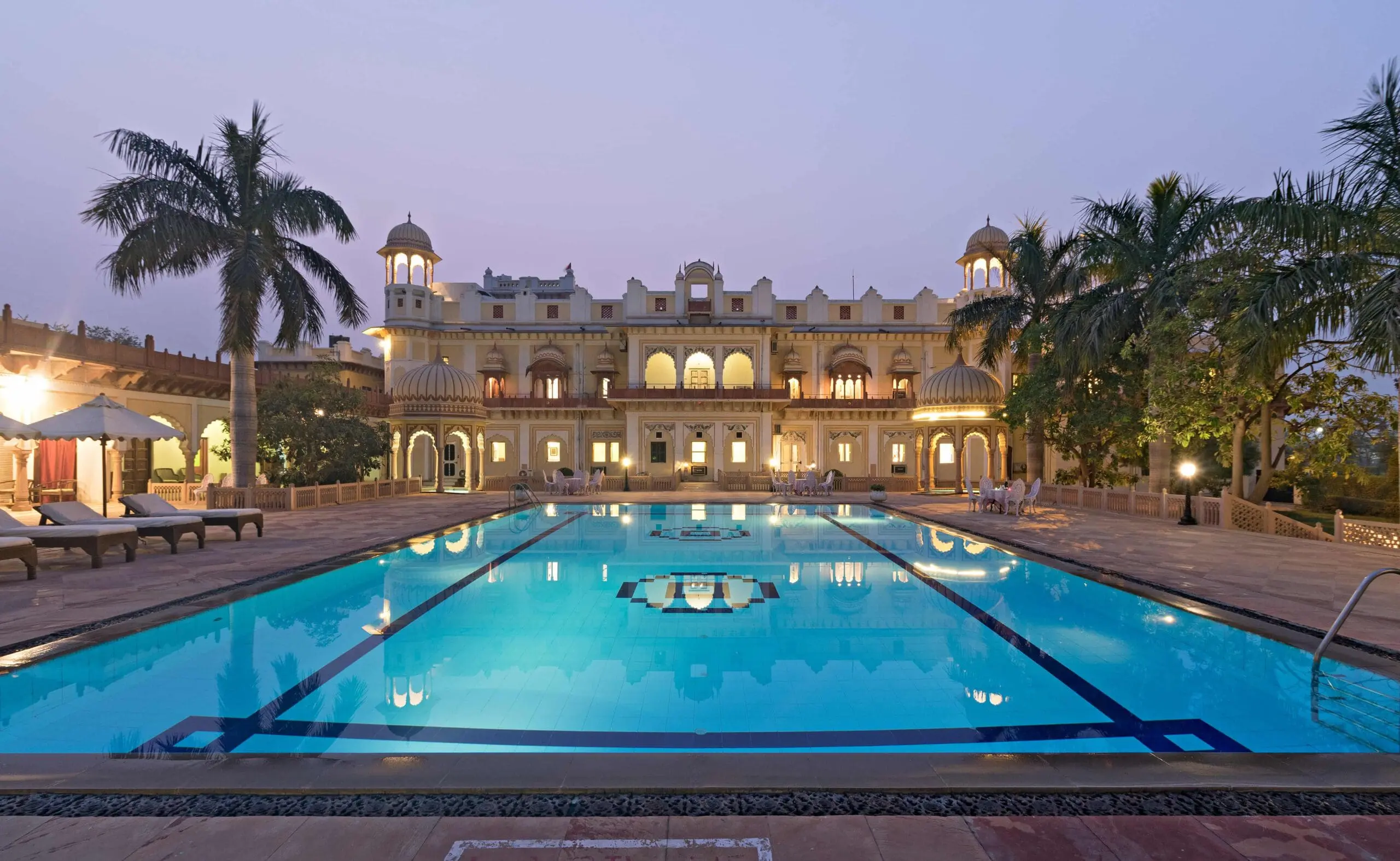 pool at dusk at laxmi vilas