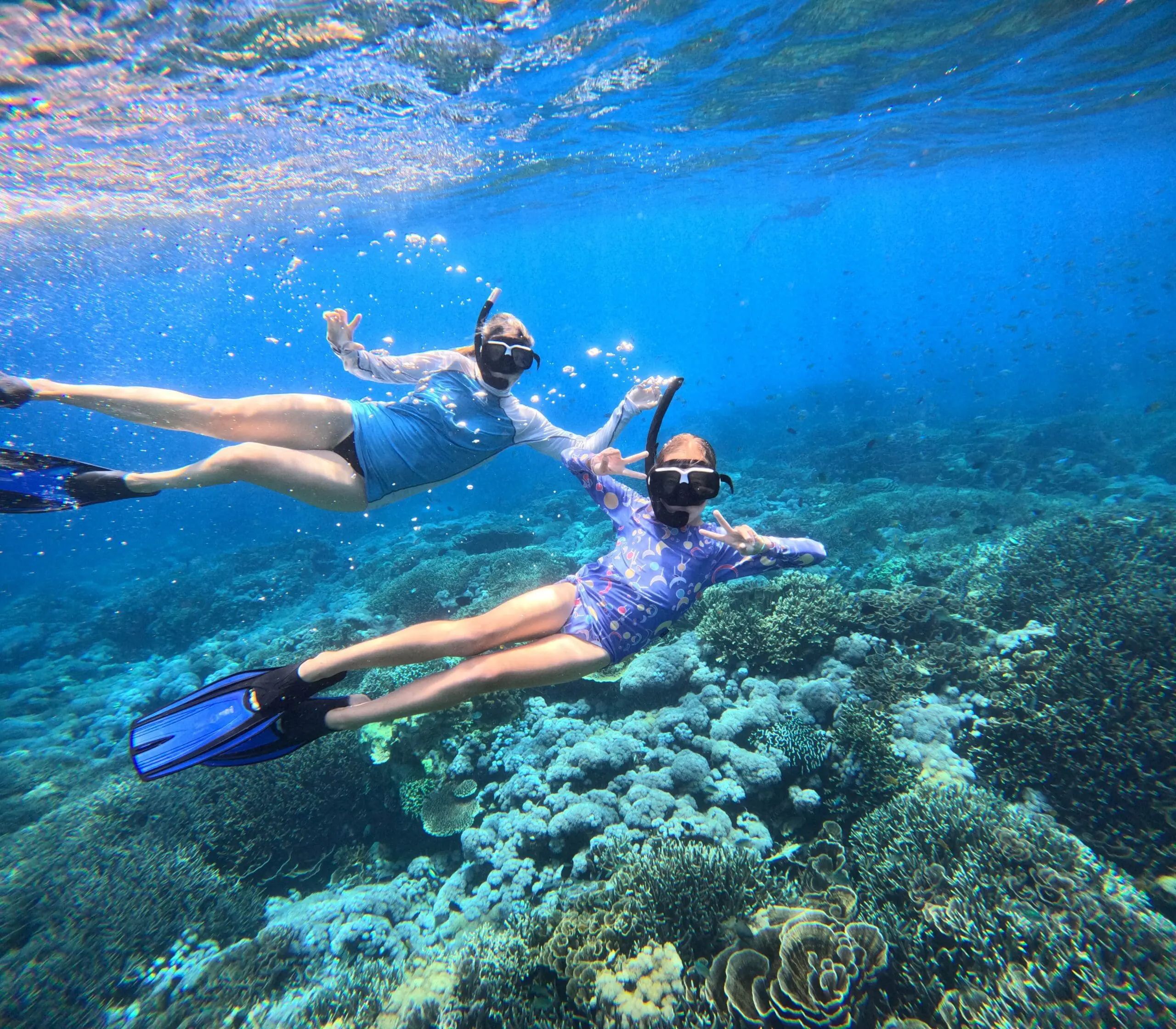 Two teens snorkelling Komodo Indonesia