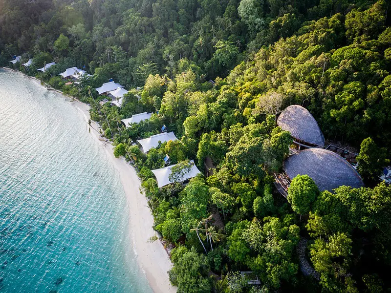Aerial view of Bawah Reserve Indonesia with beach and jungle villas