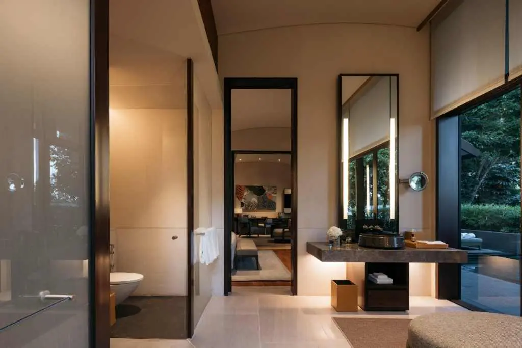 Luxury bathroom at Capella Singapore with garden views