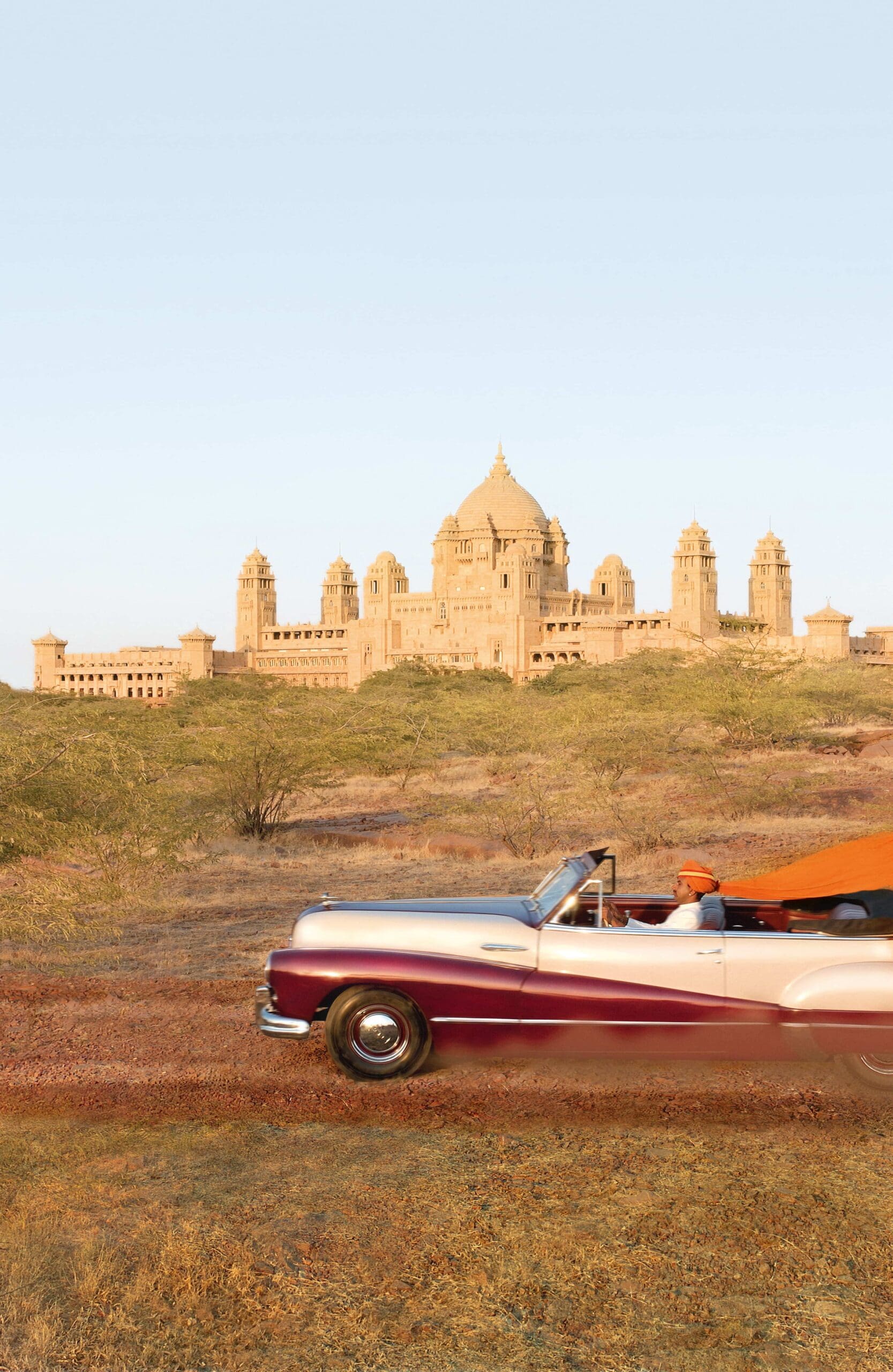 Car speeding by Umaid Bhawan Palace, Jodhpur