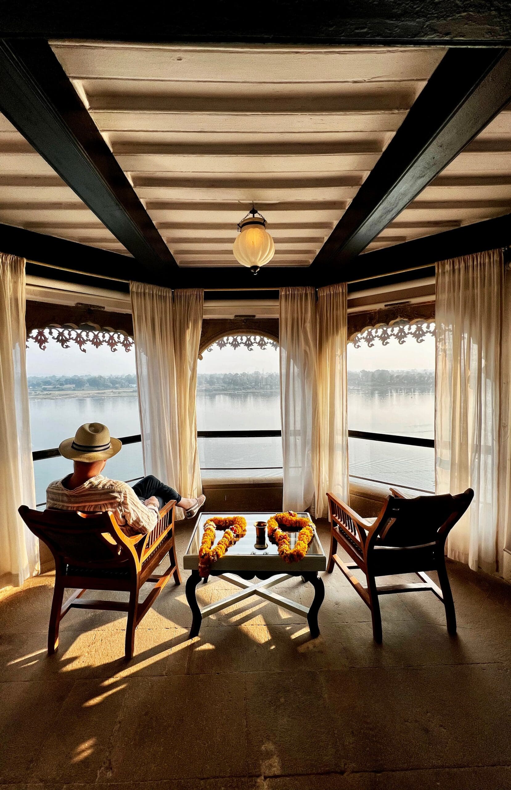 Guest looking out at Ahilya Fort