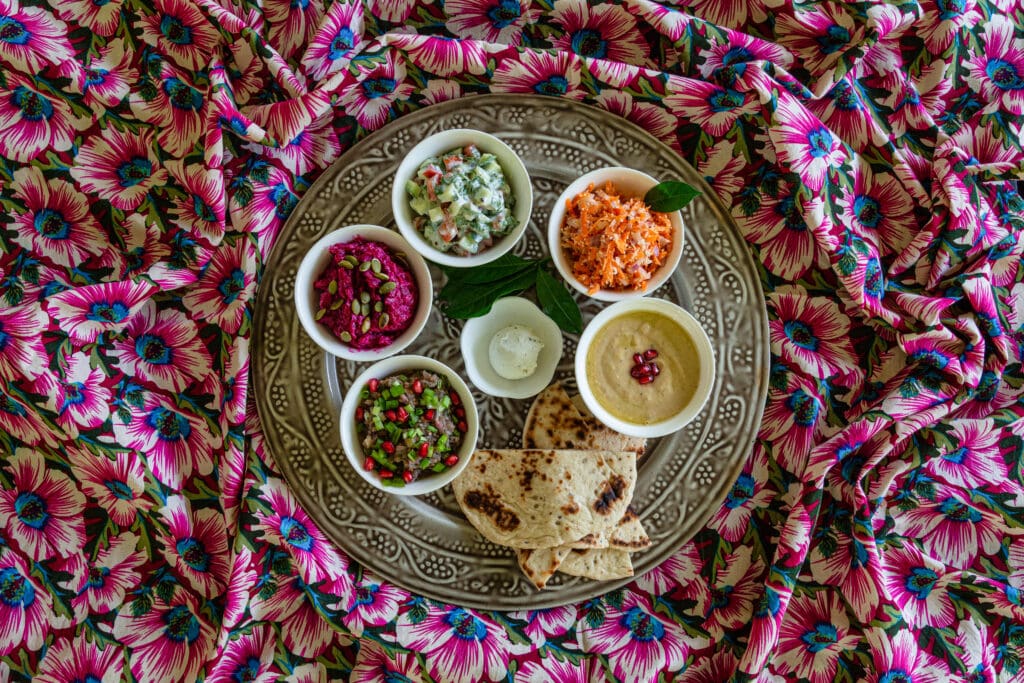 Traditional Sri Lankan dishes on a beautiful floral fabric
