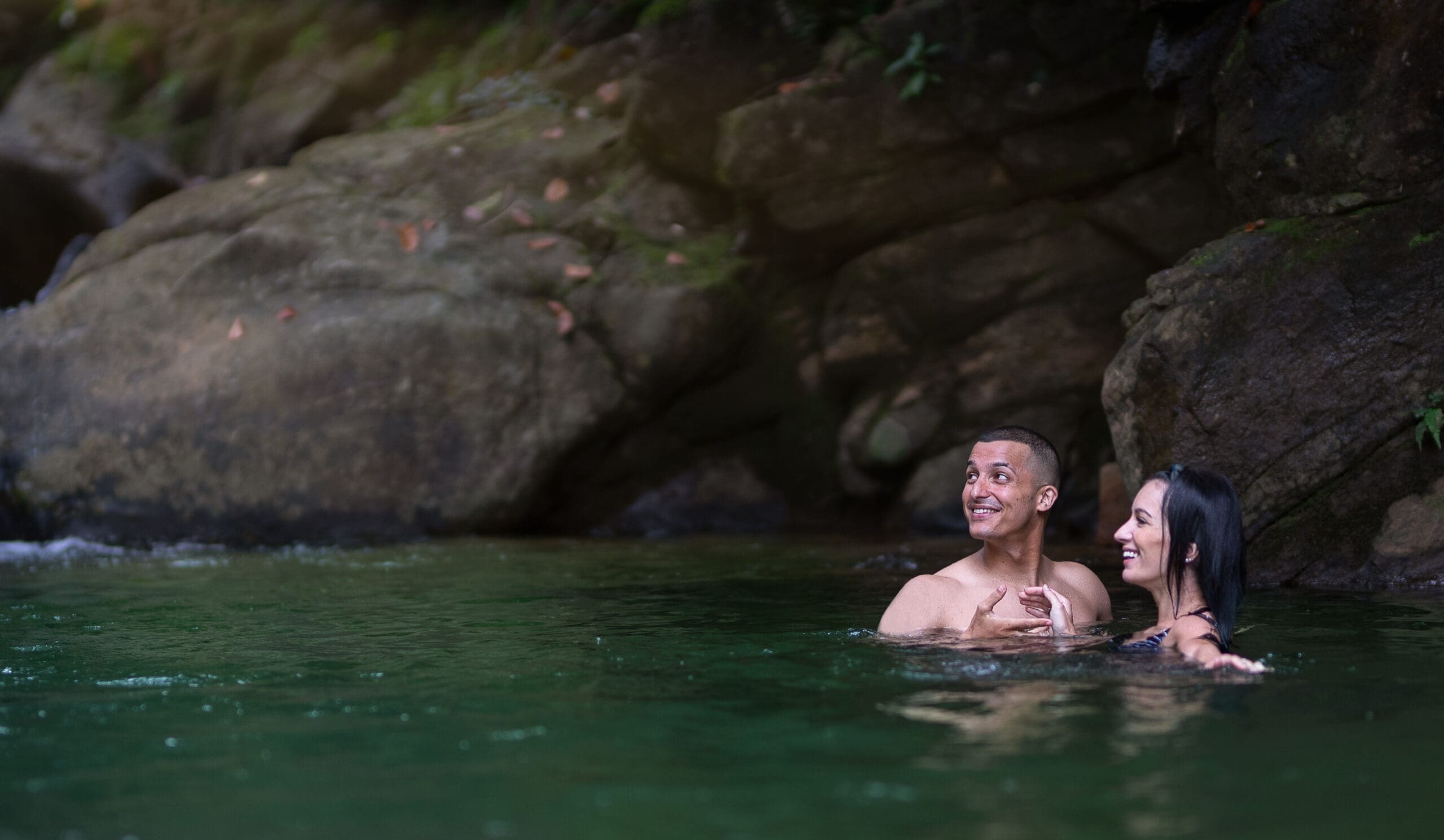 Couple swimming at Moksha
