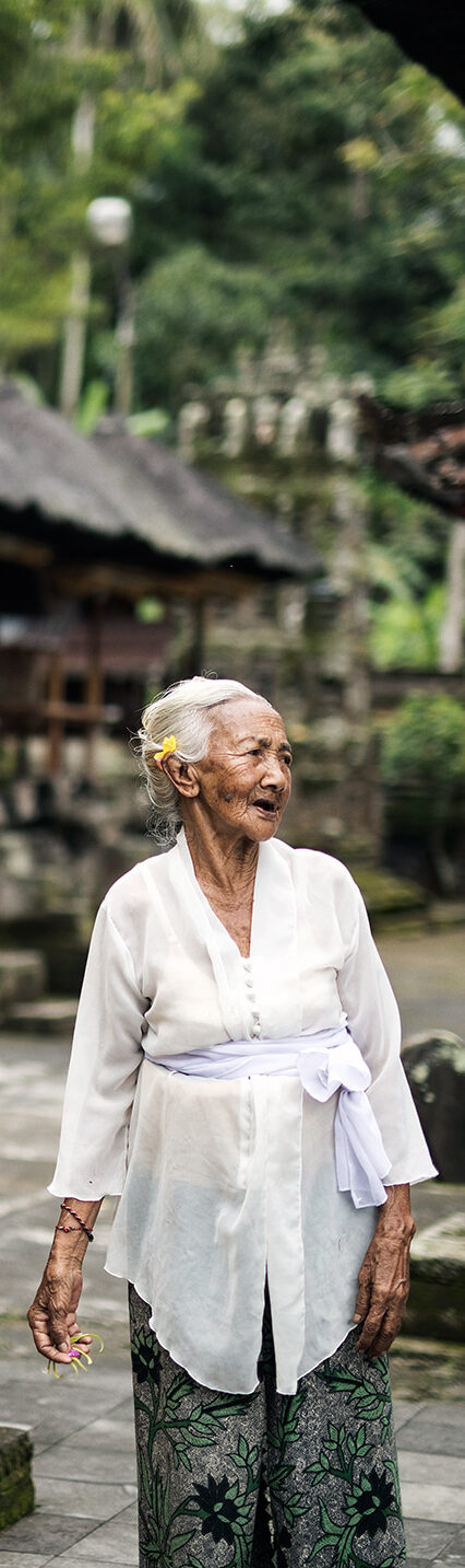 Local woman at temple in Bali