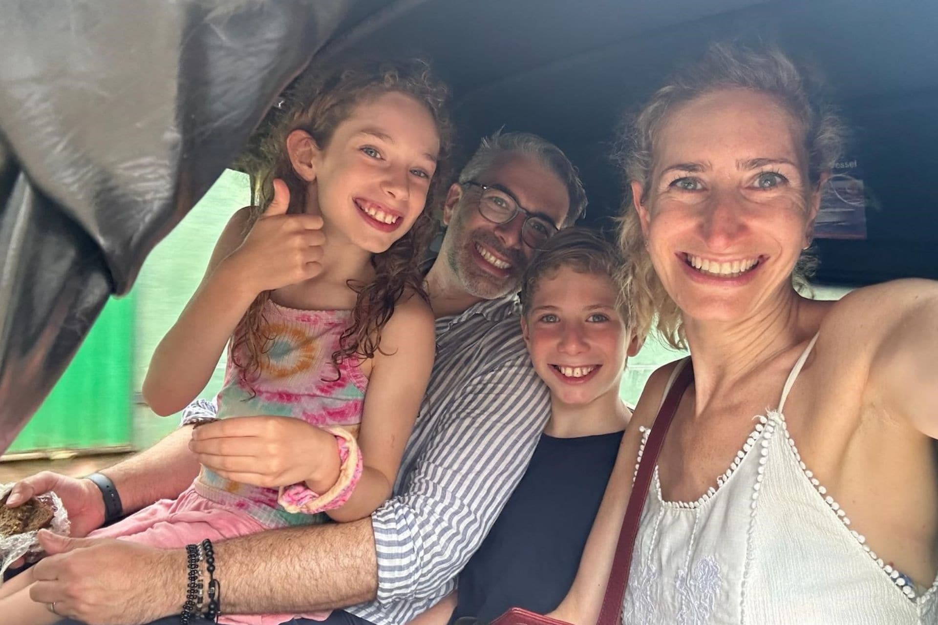 Family travelling together in Borneo during their holiday