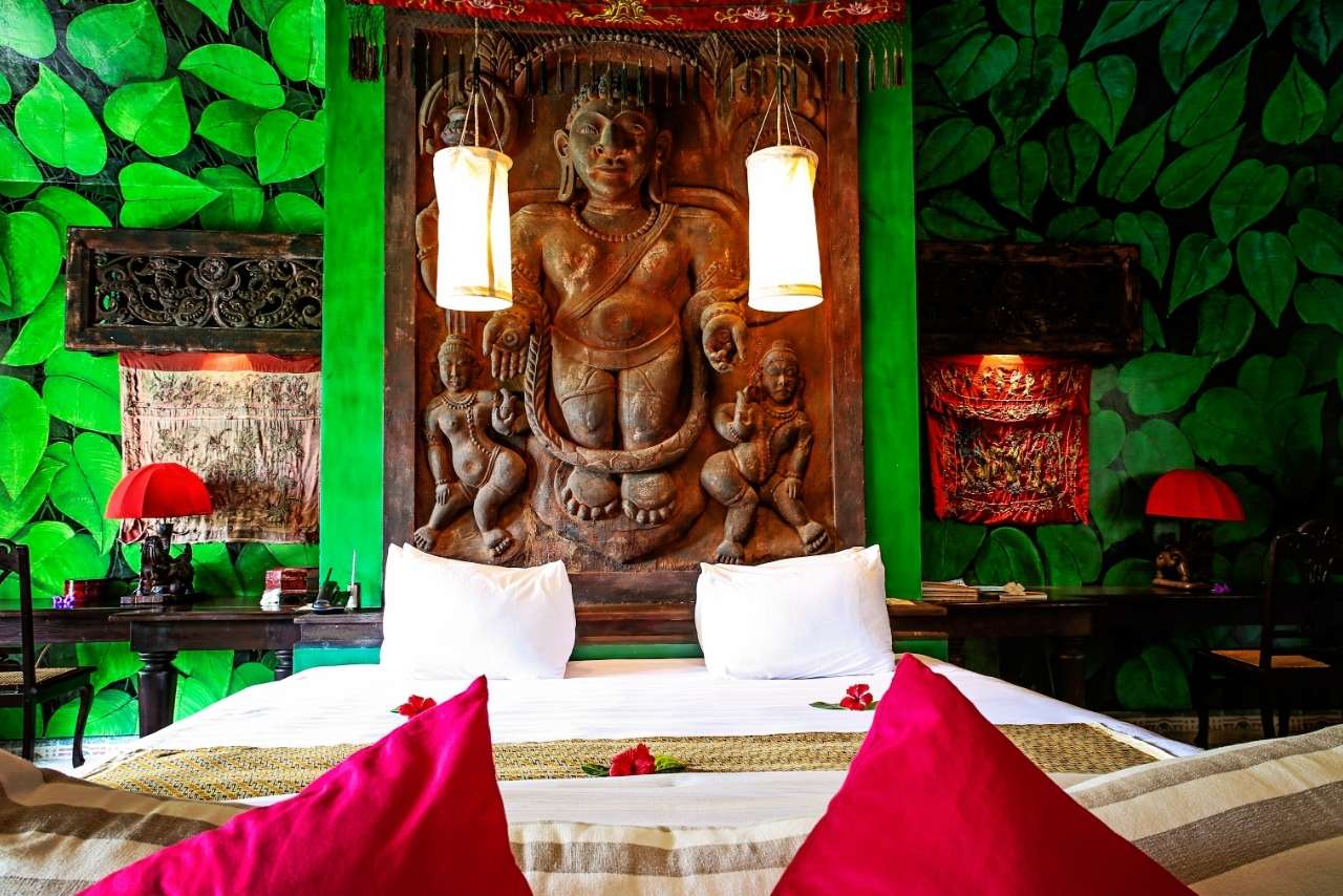 Suite interior with traditional Indonesian artwork at Tugu Lombok