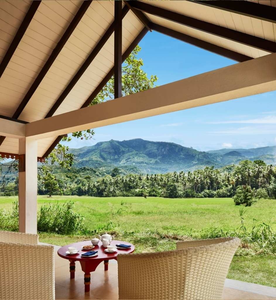 Private terrace at Jetwing Kaduruketha overlooking rice fields and distant hills