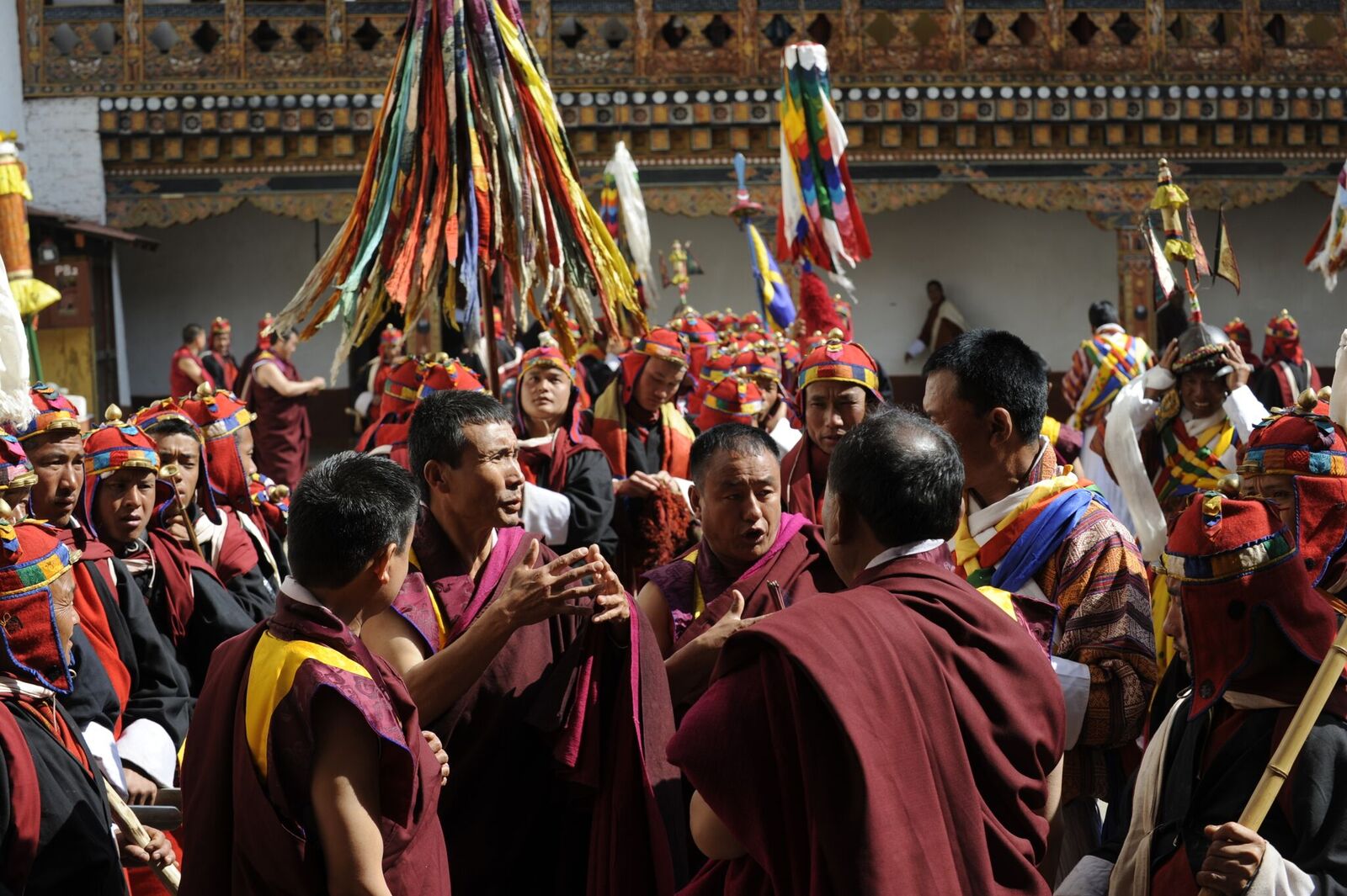 Bhutanese monks and local residents gathered during a regional festival